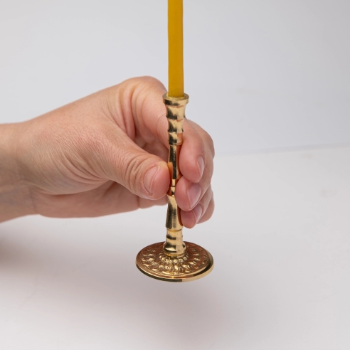 Small gold-colored candlestick for slim tapper candles with ornaments – brass