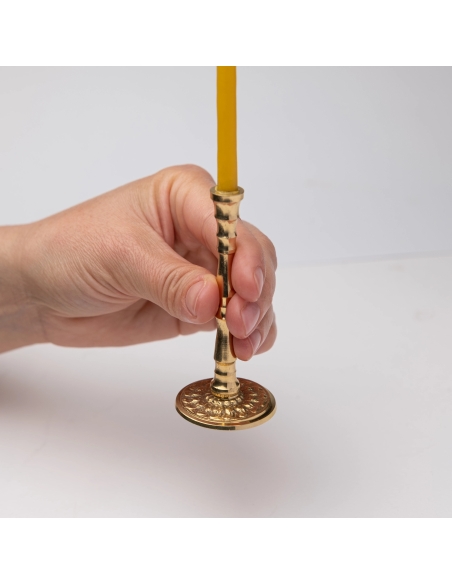 Small gold-colored candlestick for slim tapper candles with ornaments – brass