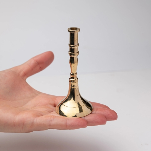 Small gold-colored candlestick for slim tapper candles, conic, brass